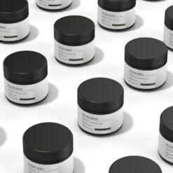 several bottles of Mikro Dose brand premium wellness supplement container with custom graphic label